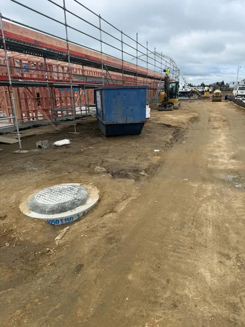 Construction equipment alongside the centre’s timber frame
